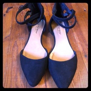 Strapped Black Flats.